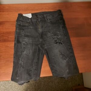 Black ripped skinny jeans